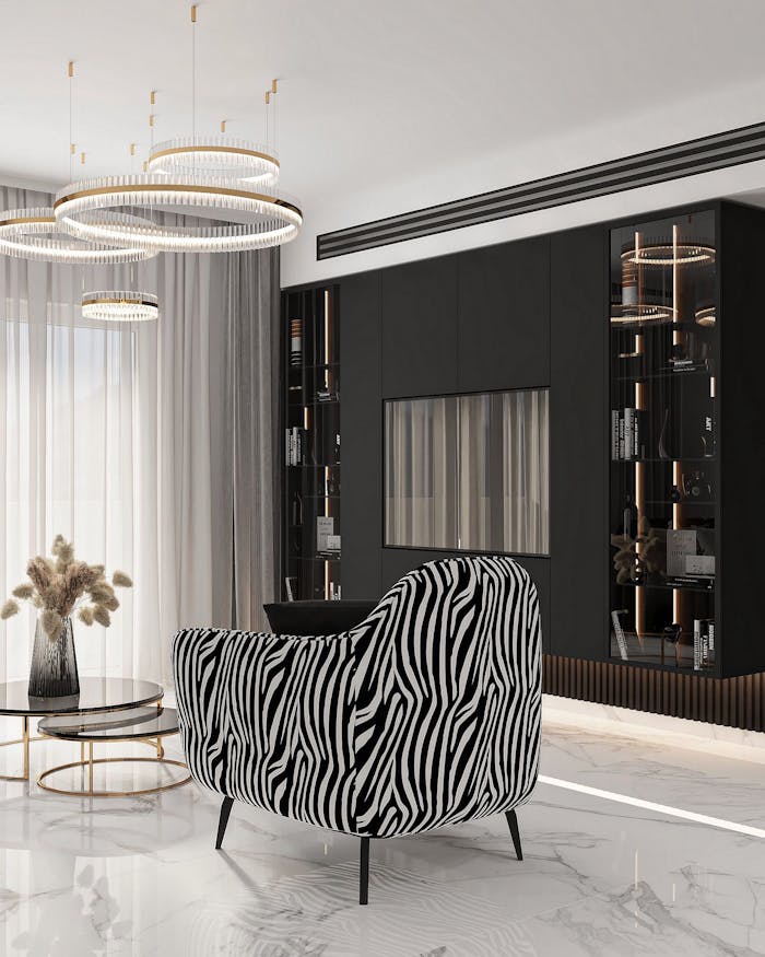who-we-are Elegant modern living room featuring a zebra print armchair and stylish lighting in Israel.